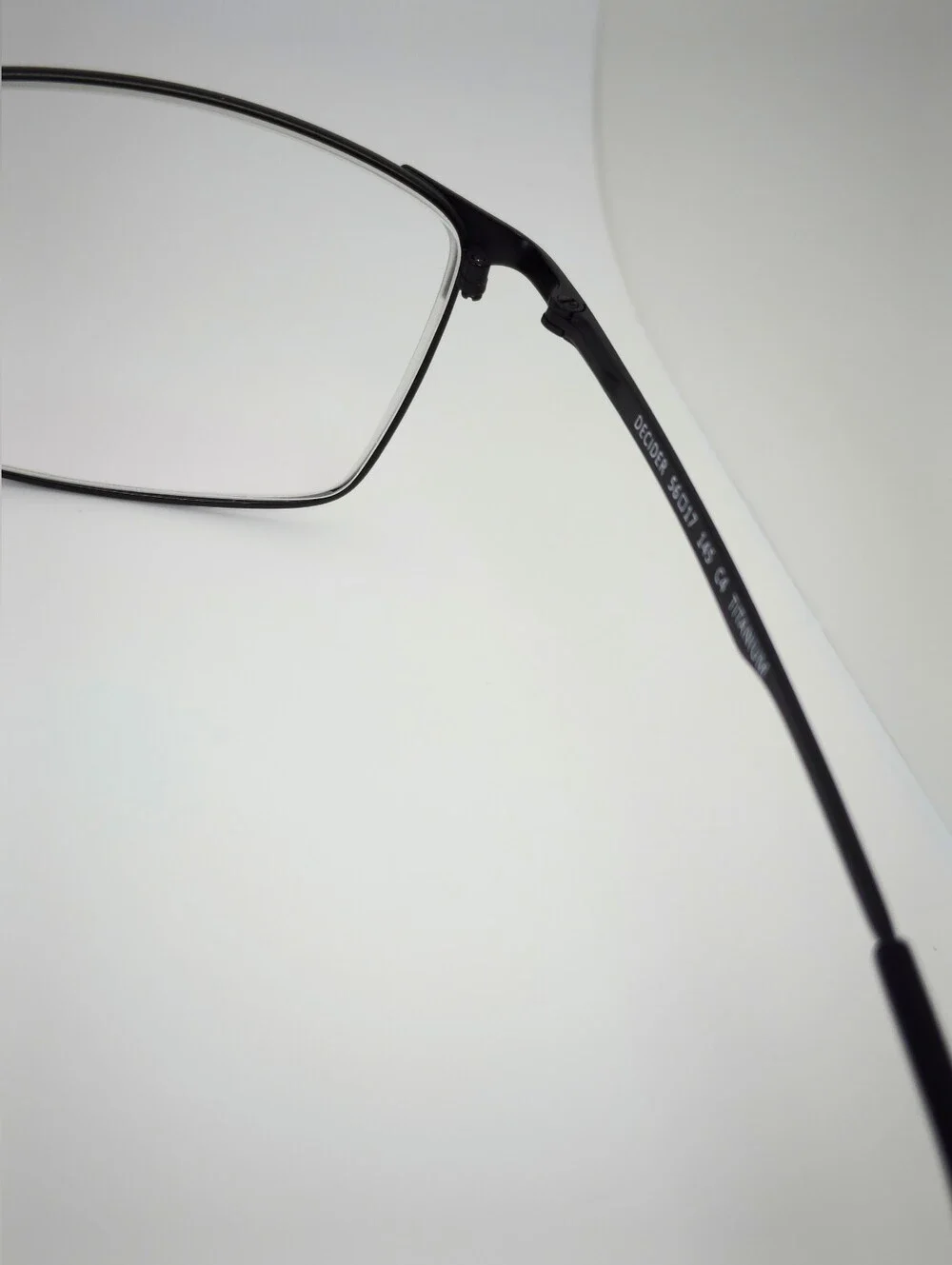 Decider. Womens Black Low Gloss Rectangular Titanium Frame.
